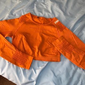 size small orange gymshark crop top